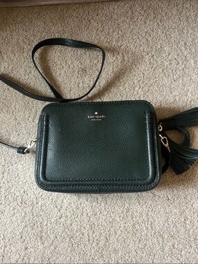 kate spade dark green pebbled leather crossbody with tassel